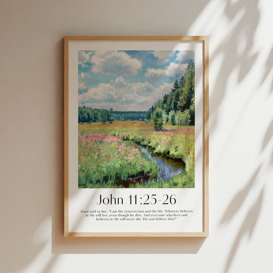 A framed Christian Print for Easter hanging in a room with a vintage landscape and the bible verse John 11