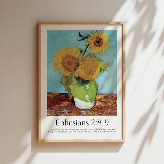 A framed Christian Print with a vintage floral print hanging on the wall by Van Gogh and the bible verse Ephesians 2:8-9