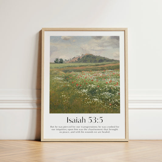 A large framed Christian Print in the hall with a vintage landscape and the bible verse Isaiah 53:5