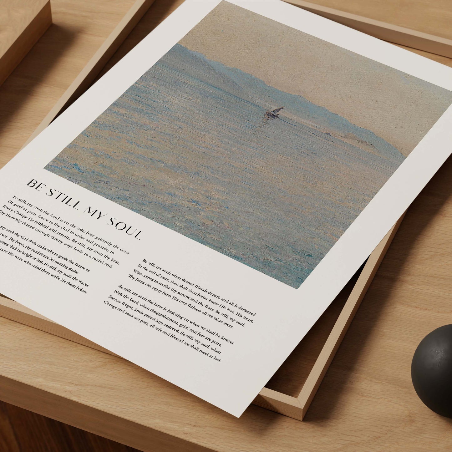 Framed Christian wall art print featuring a serene seascape in a vintage style. The artwork is paired with the comforting lyrics of the hymn "Be Still My Soul," offering words of peace and faith. This piece combines calming scenery with spiritual reflection, making it an ideal addition to any home or prayer space.
