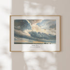 Framed Psalm 19:1 Bible verse wall art with dramatic blue-grey clouds and soft natural window shadows.