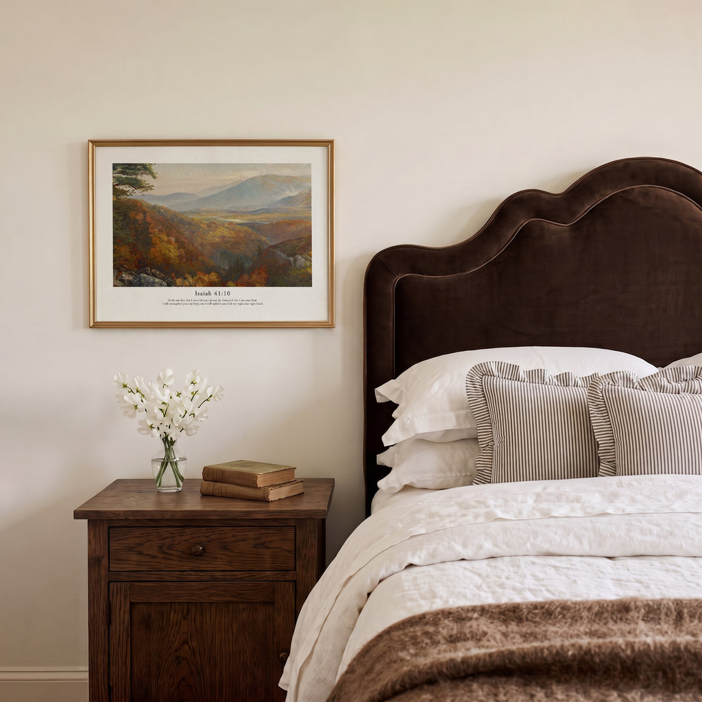 Isaiah 41:10 Christian art print featuring a misty mountain valley, styled above a wooden bedside table.