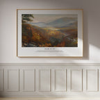 Isaiah 41:10 Christian wall art featuring a peaceful mountain valley landscape, framed on a white panelled wall.