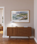 Exodus 14:14 Christian art print featuring white cliffs and a sweeping coastline, styled above a wooden console.