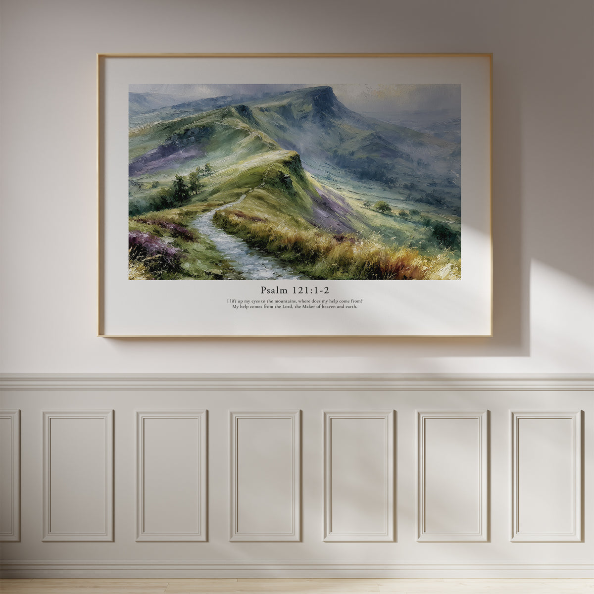 Psalm 121:1–2 Christian wall art featuring a peaceful green mountain landscape, framed on a white panelled wall.