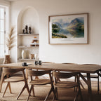 Psalm 46:10 Christian art print featuring a tranquil mountain lake, displayed in a warm neutral dining room.