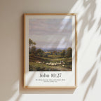 A framed Christian Print for Easter hanging on the wall with a vintage landscape and the bible verse John 10-27 My sheep hear my voice