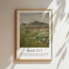 A framed Christian Print hanging on a wall with a vintage landscape and the bible verse Isaiah 53:5