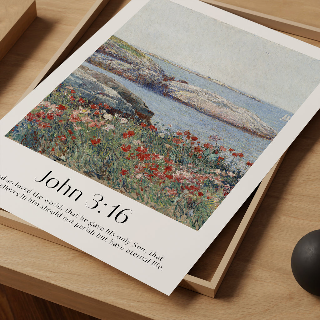 A close up of a framed Christian Print with a vintage seascape and the bible verse John 3:16