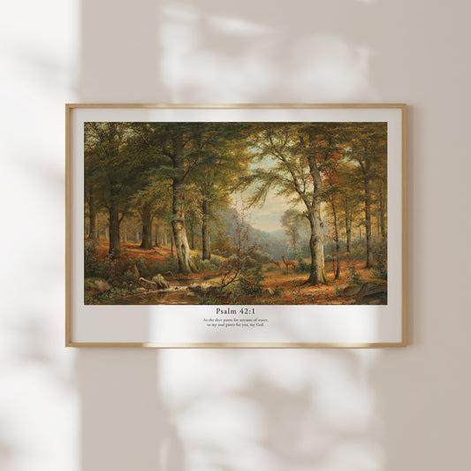 Framed artwork of a forest scene with Psalm 42:1 text on a wall.