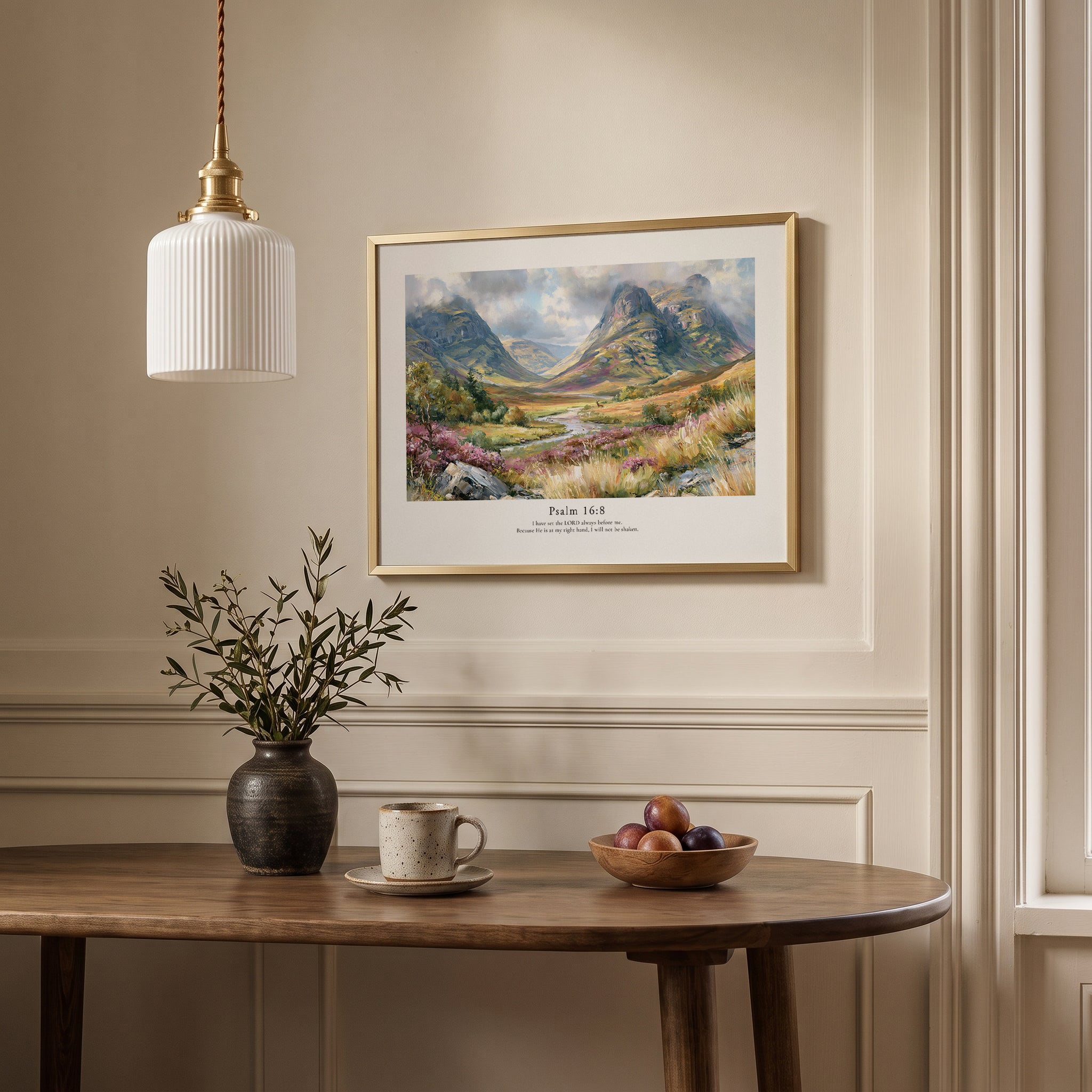Framed scripture wall art with Psalm 16:8 and a dramatic mountain landscape, displayed above a dining table.