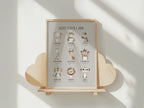 Framed Christian children's poster with illustrations of animals and bible affirmations on a wooden stand.