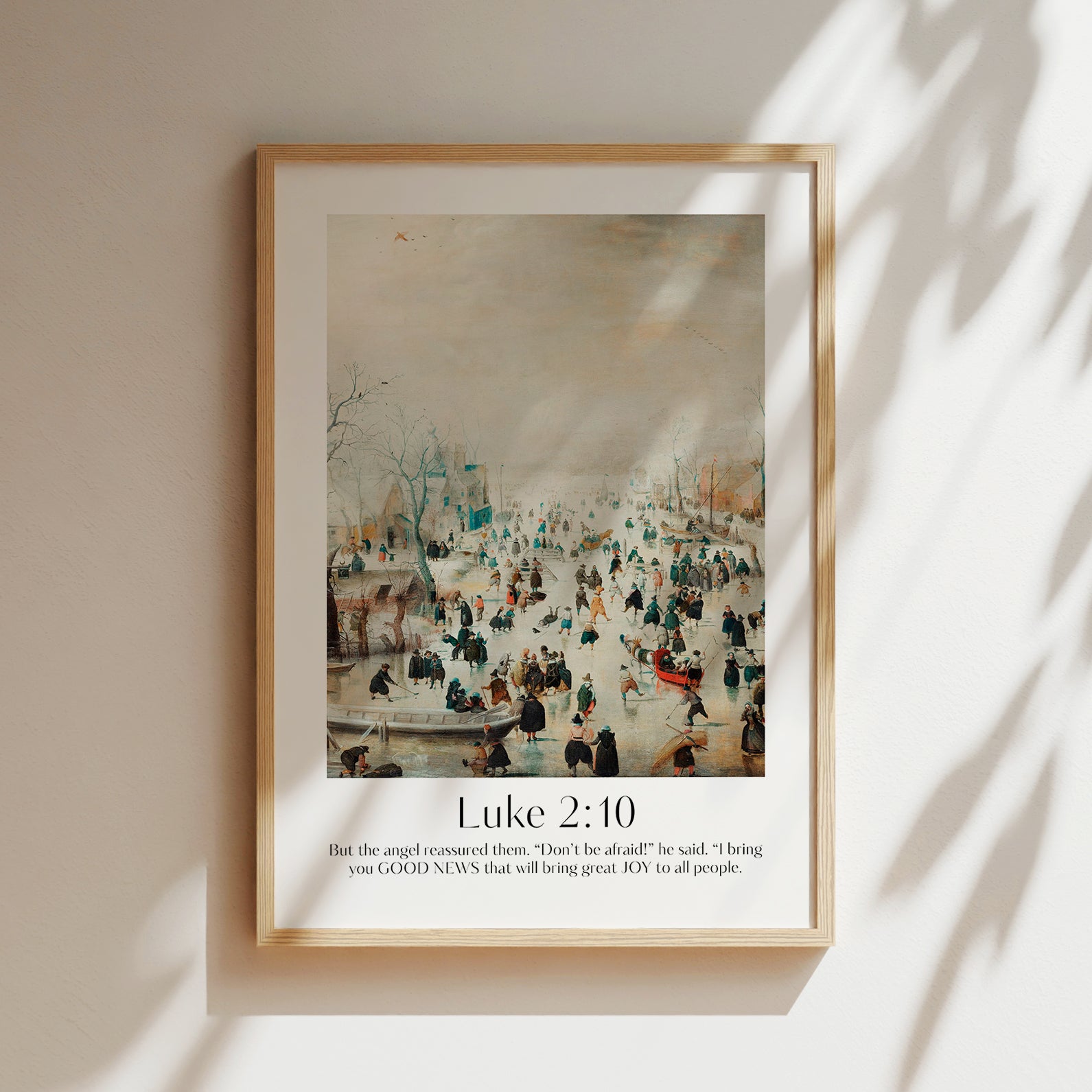 Vintage Christian Christmas Framed Print with people ice-skating and the bible verse from luke 2:10: But the angel reassured them. 'Don't be afraid!' he said. 'I bring you Good News that will bring great Joy to all people.