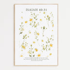 Framed Christian wall art print featuring a delicate botanical illustration of soft yellow flowers. The artwork is paired with the Bible verse Isaiah 40:31: "But those who hope in the Lord will renew their strength. They will soar on wings like eagles; they will run and not grow weary, they will walk and not be faint." This serene piece brings nature and scripture together, making it an ideal addition to any home or prayer space.