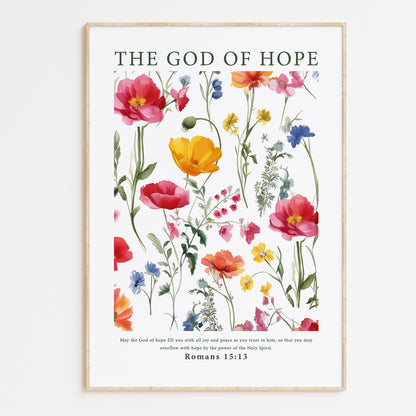 Framed Christian wall art print featuring a beautiful botanical illustration with vibrant flowers. The artwork is paired with the Bible verse from Romans 15:13: "May the God of hope fill you with all joy and peace as you trust in him, so that you may overflow with hope by the power of the Holy Spirit." This piece combines nature's beauty with an uplifting message, making it a perfect addition to any home or prayer space.