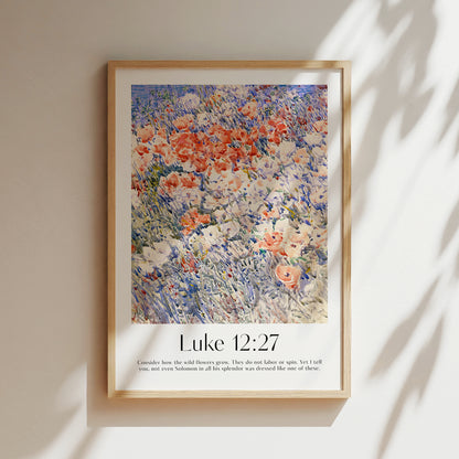 Framed Christian wall art print featuring a vibrant wildflower field inspired by Childe Hassam. Displays the Bible verse Luke 12:27: "Consider how the wild flowers grow. They do not labor or spin. Yet I tell you, not even Solomon in all his splendor was dressed like one of these." This artwork combines impressionist-style florals with reflective scripture, making it a colorful addition to any Christian home. Elegantly framed in light wood, perfect for enhancing living room or hallway decor.