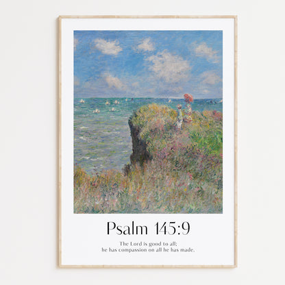 Framed Christian wall art print inspired by Claude Monet, featuring a vibrant coastal scene with flowers and greenery on a cliff overlooking the sea. The painting is paired with the Bible verse Psalm 145:9: "The Lord is good to all; he has compassion on all he has made." The artwork radiates peace and beauty, making it a perfect addition to any home.