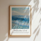 Framed Christian wall art print featuring a dynamic ocean scene inspired by the style of Clement. Displays the Bible verse Proverbs 3:5-6: "Trust in the Lord with all your heart and lean not on your own understanding; in all your ways submit to him, and he will make your paths straight." This artwork blends a powerful seascape with encouraging scripture, making it a striking addition to any Christian home. Elegantly framed in light wood, perfect for enhancing living room or office decor.