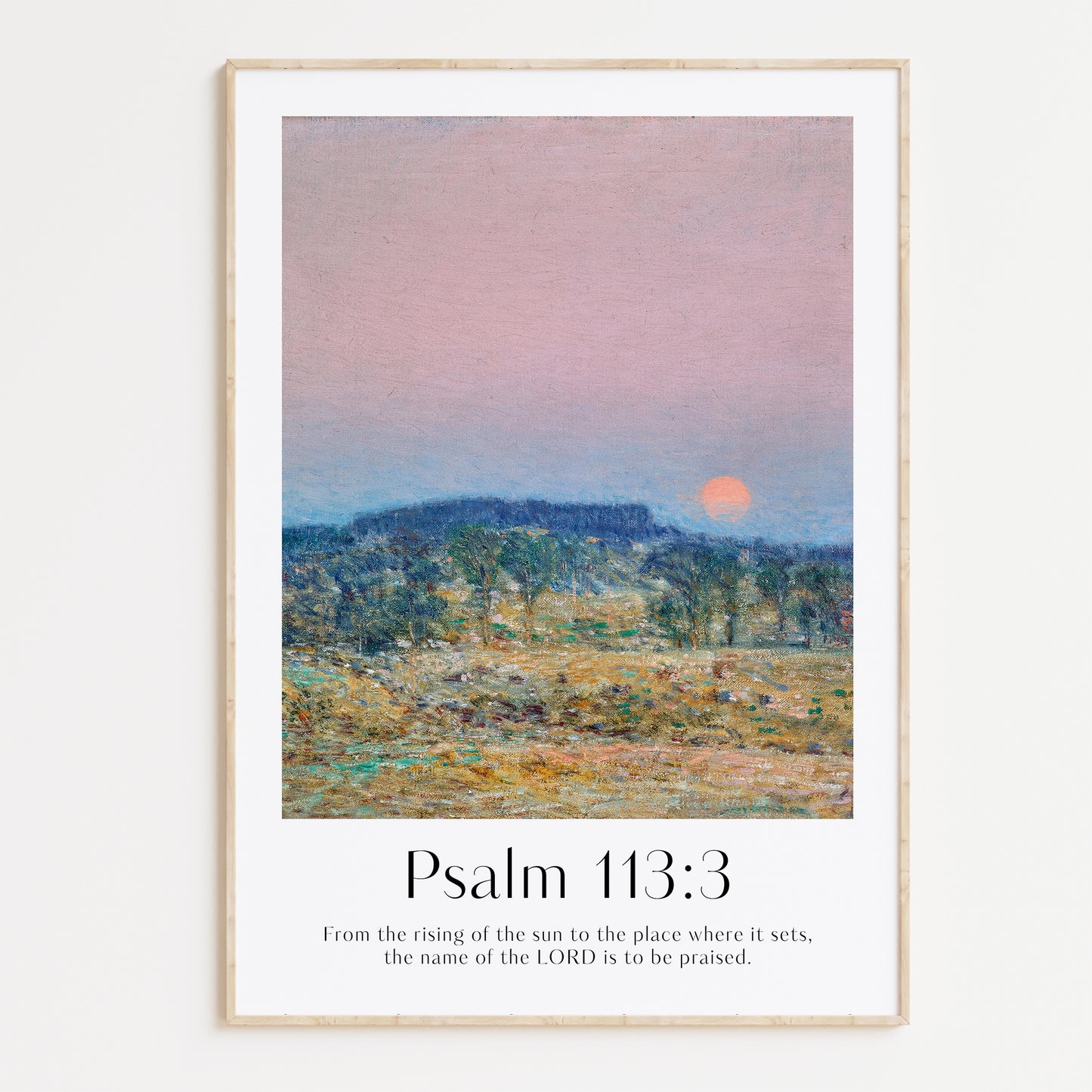 Framed Christian wall art print featuring a serene sunrise landscape inspired by Childe Hassam. Displays the Bible verse Psalm 113:3: "From the rising of the sun to the place where it sets, the name of the LORD is to be praised." This artwork combines impressionist-style scenery with uplifting scripture, making it a peaceful addition to any Christian home. Elegantly framed in light wood, perfect for enhancing living room or bedroom decor.