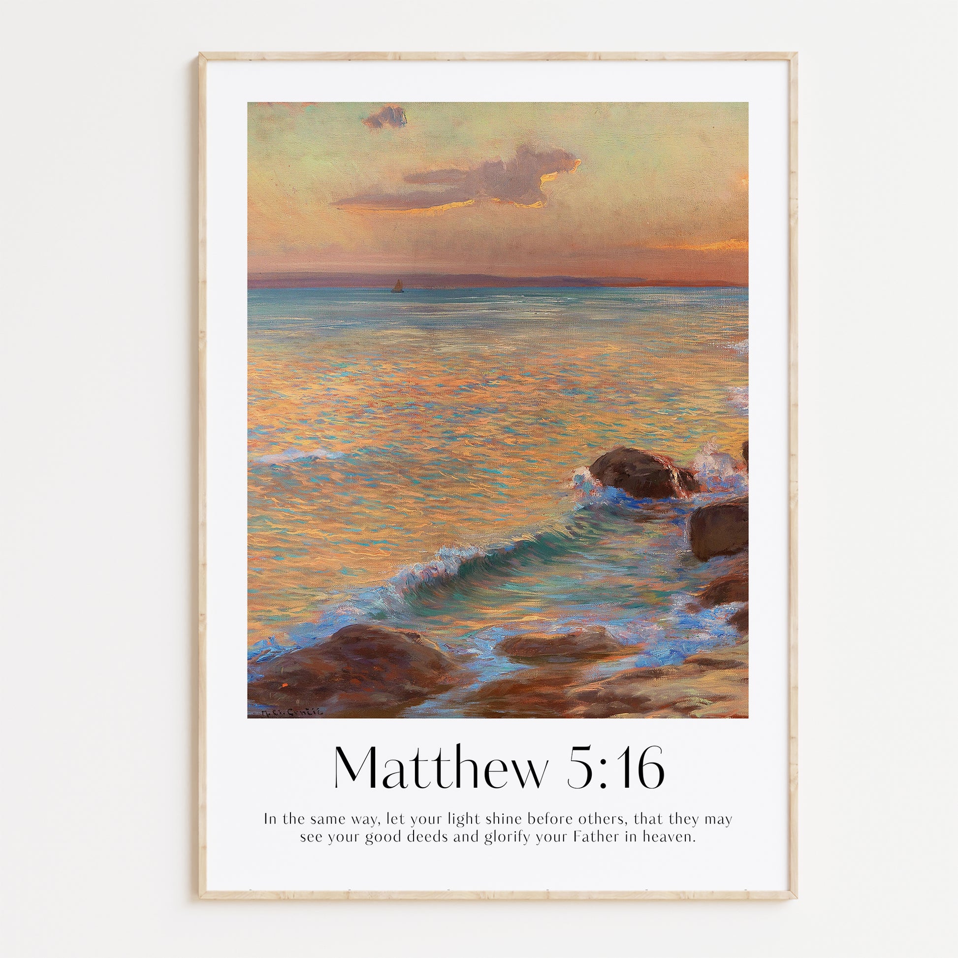 Framed Christian wall art print featuring a stunning coastal sunset scene inspired by Menci Clement. The artwork displays a serene ocean view at dusk, with gentle waves lapping against the rocks, paired with the Bible verse Matthew 5:16: "In the same way, let your light shine before others, that they may see your good deeds and glorify your Father in heaven." This piece combines beautiful scenery with a message of spiritual encouragement, making it a thoughtful addition to any home or prayer space.