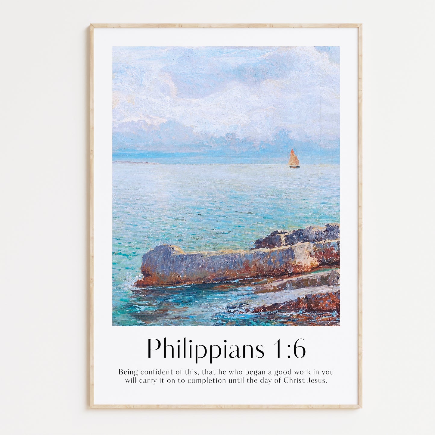 Framed Christian wall art print featuring a serene coastal scene inspired by Menci Clement. The artwork depicts a tranquil ocean view with a distant sailboat, paired with the Bible verse Philippians 1:6: "Being confident of this, that he who began a good work in you will carry it on to completion until the day of Christ Jesus." This piece beautifully combines peaceful scenery with spiritual encouragement, making it a thoughtful addition to any home or prayer space.