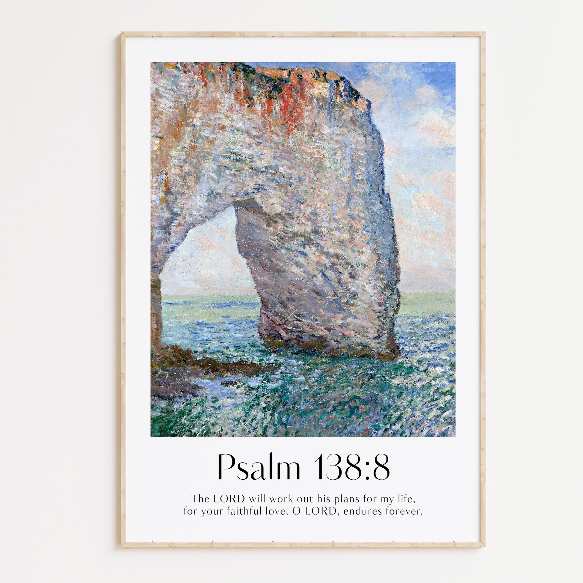 Framed Christian wall art print featuring a coastal rock formation inspired by Claude Monet. Displays the Bible verse Psalm 138:8: "The LORD will work out his plans for my life, for your faithful love, O LORD, endures forever." This artwork combines impressionist-style scenery with uplifting scripture, making it a striking addition to any Christian home. Elegantly framed in light wood, ideal for enhancing living room or office decor.