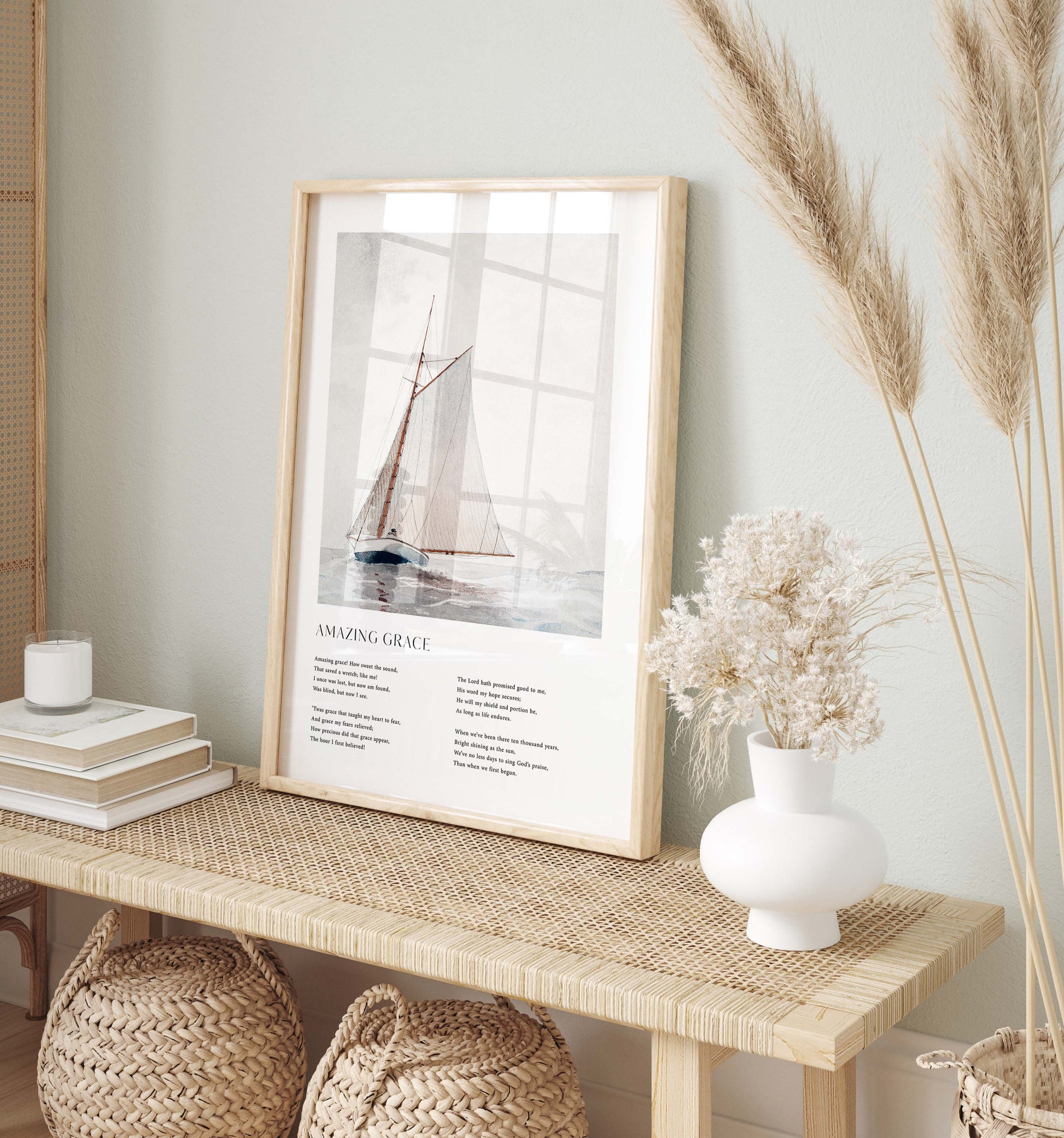Framed Christian wall art print featuring a vintage-style illustration of a sailboat on the open sea. The artwork is paired with the timeless lyrics of "Amazing Grace," offering words of redemption and faith. This piece beautifully combines nautical imagery with spiritual reflection, making it an ideal addition to any home or prayer space.