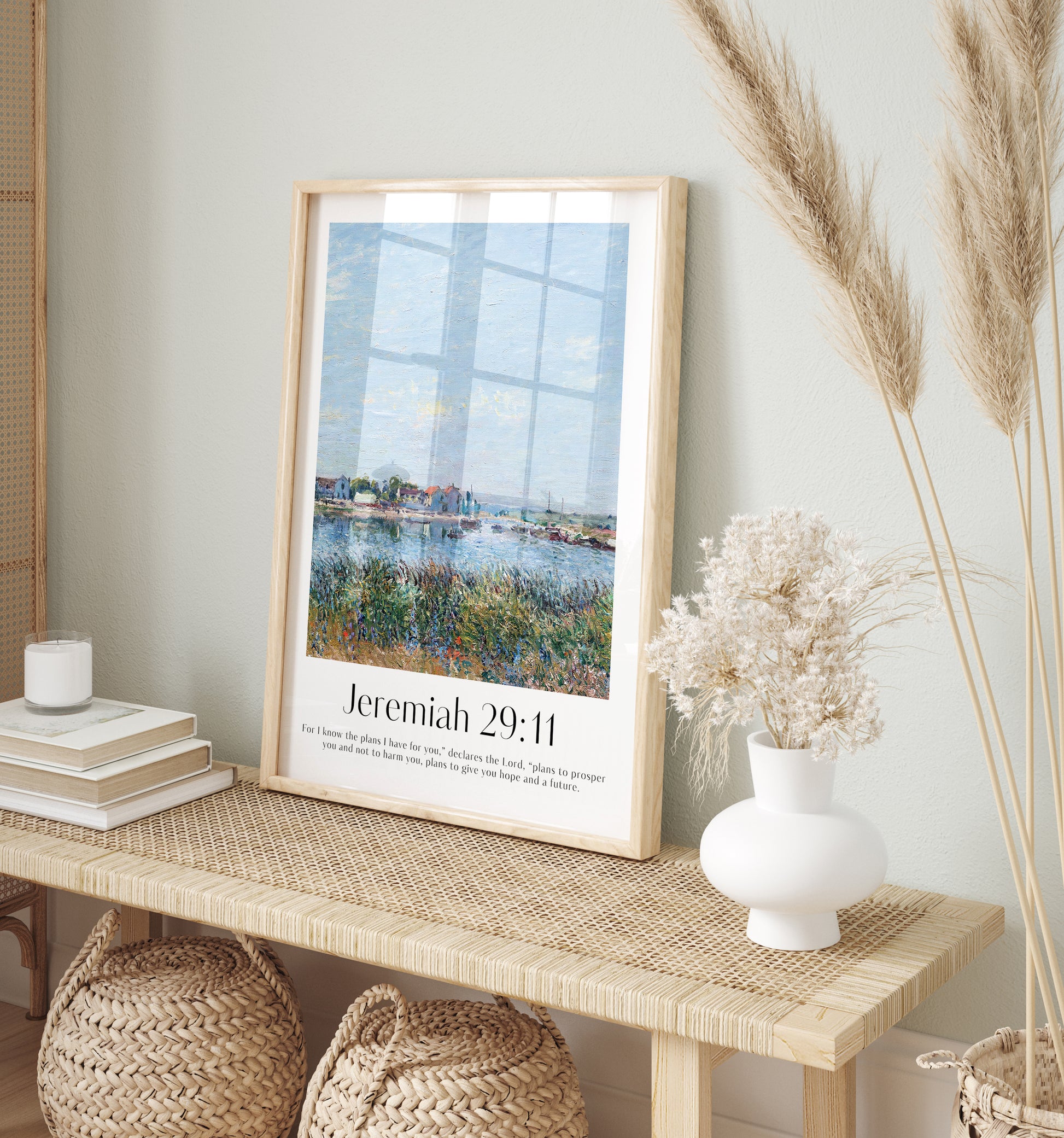 Framed Christian wall art print featuring a vintage-style landscape inspired by Alfred Sisley. The artwork shows a peaceful riverside village scene, paired with the Bible verse Jeremiah 29:11: "For I know the plans I have for you," declares the Lord, "plans to prosper you and not to harm you, plans to give you hope and a future." This piece combines serene imagery with a message of hope and faith, making it perfect for home decor or a prayer space.