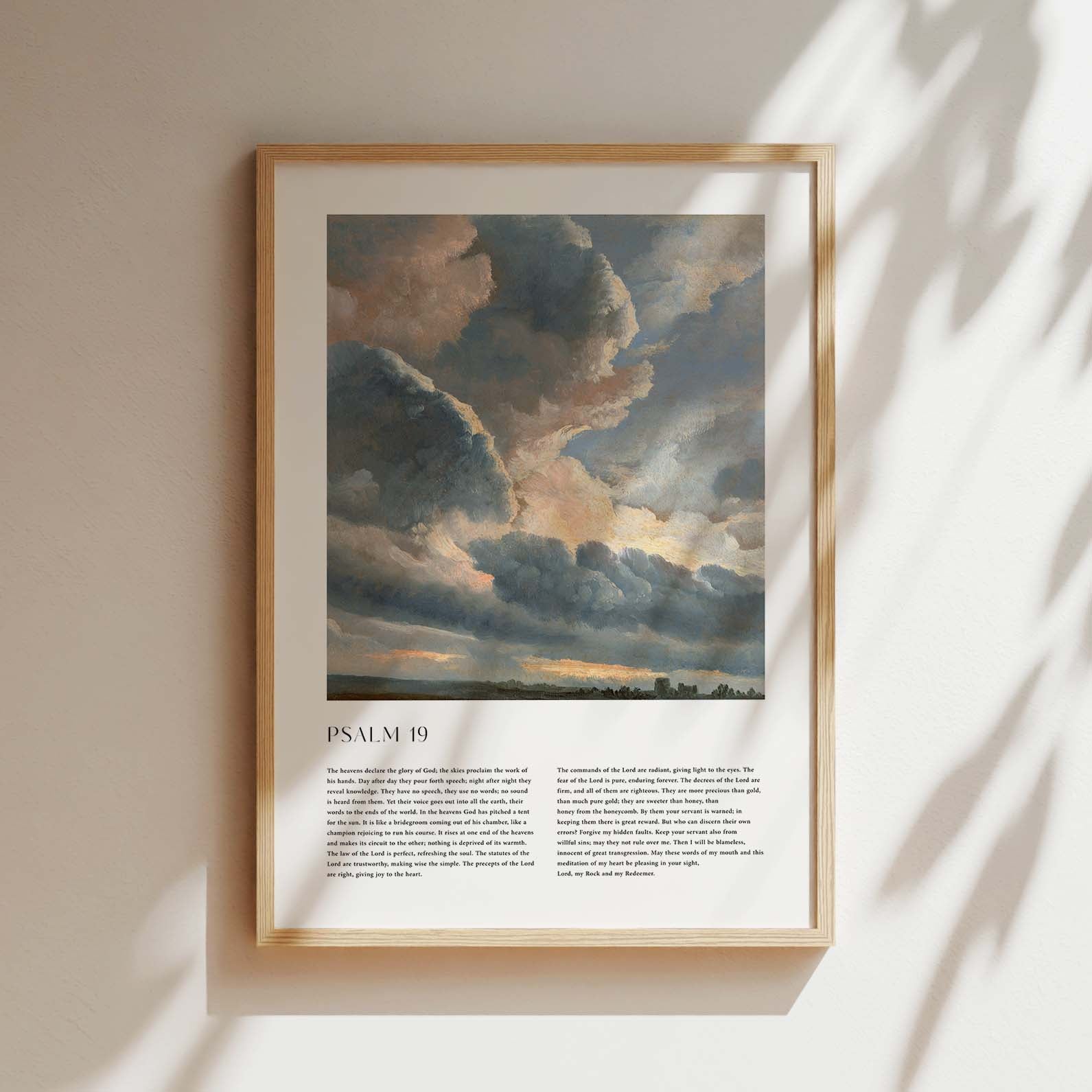 Framed Christian wall art print featuring a dramatic sky landscape in a vintage style. The artwork displays towering, illuminated clouds over a serene horizon, paired with the full text of Psalm 19. This piece combines the majesty of the natural world with spiritual reflection, making it an inspiring addition to any home or place of worship.