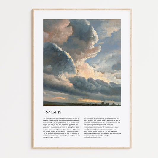 Framed Christian wall art print featuring a dramatic sky landscape in a vintage style. The artwork displays towering, illuminated clouds over a serene horizon, paired with the full text of Psalm 19. This piece combines the majesty of the natural world with spiritual reflection, making it an inspiring addition to any home or place of worship.