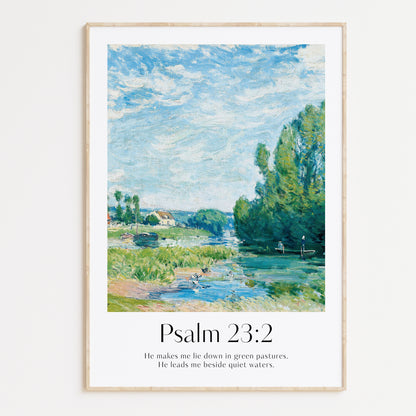 Framed Christian wall art print featuring a vintage-style countryside river scene inspired by Alfred Sisley. The artwork is paired with the Bible verse Psalm 23:2: "He makes me lie down in green pastures. He leads me beside quiet waters." This peaceful imagery, combined with the comforting scripture, creates a serene addition to any home or prayer space.