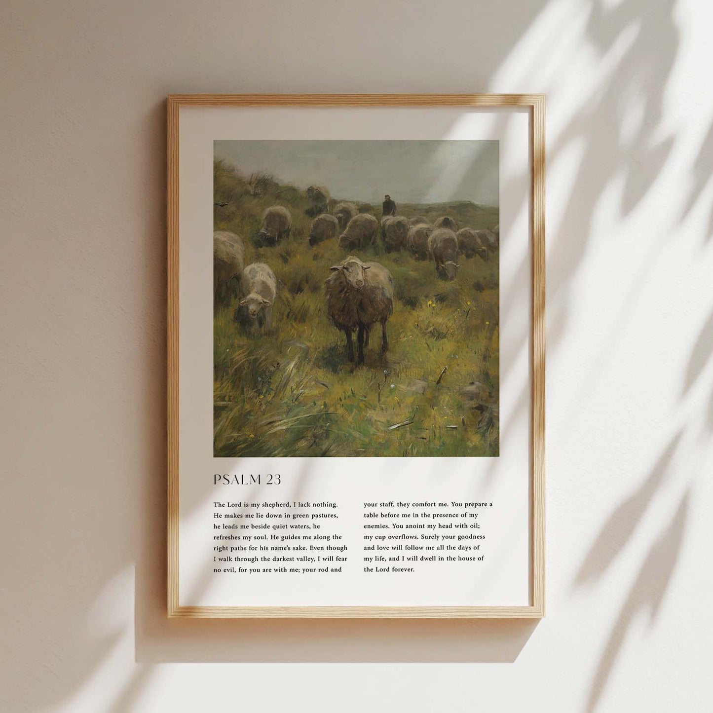 Framed Christian wall art print featuring a peaceful pastoral scene with a shepherd and his flock of sheep, inspired by a vintage style. The artwork is paired with the full text of Psalm 23: "The Lord is my shepherd, I lack nothing...and I will dwell in the house of the Lord forever." This piece combines serene rural imagery with a comforting spiritual message, making it a perfect addition to any home or prayer space.