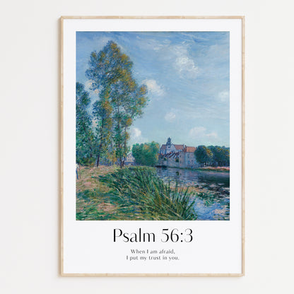 Framed Christian wall art print featuring a vintage-style landscape scene inspired by Alfred Sisley. The artwork showcases a serene riverside with a church in the background, paired with the Bible verse Psalm 56:3: "When I am afraid, I put my trust in you." This calming imagery, combined with the comforting scripture, makes it an ideal piece for creating a peaceful atmosphere in any home or prayer space.