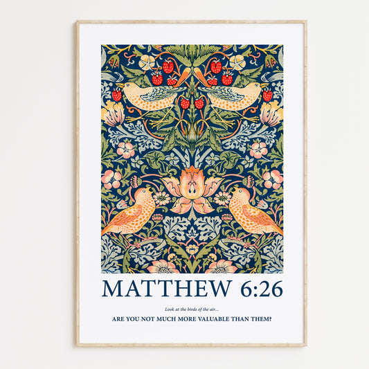 Framed Christian wall art print featuring a detailed floral and bird pattern inspired by William Morris. Displays the Bible verse Matthew 6:26: "Look at the birds of the air... Are you not much more valuable than them?" This artwork blends classic, nature-inspired design with a powerful scripture, making it a meaningful addition to any Christian home. Elegantly framed in light wood, perfect for enhancing living room or prayer space decor.