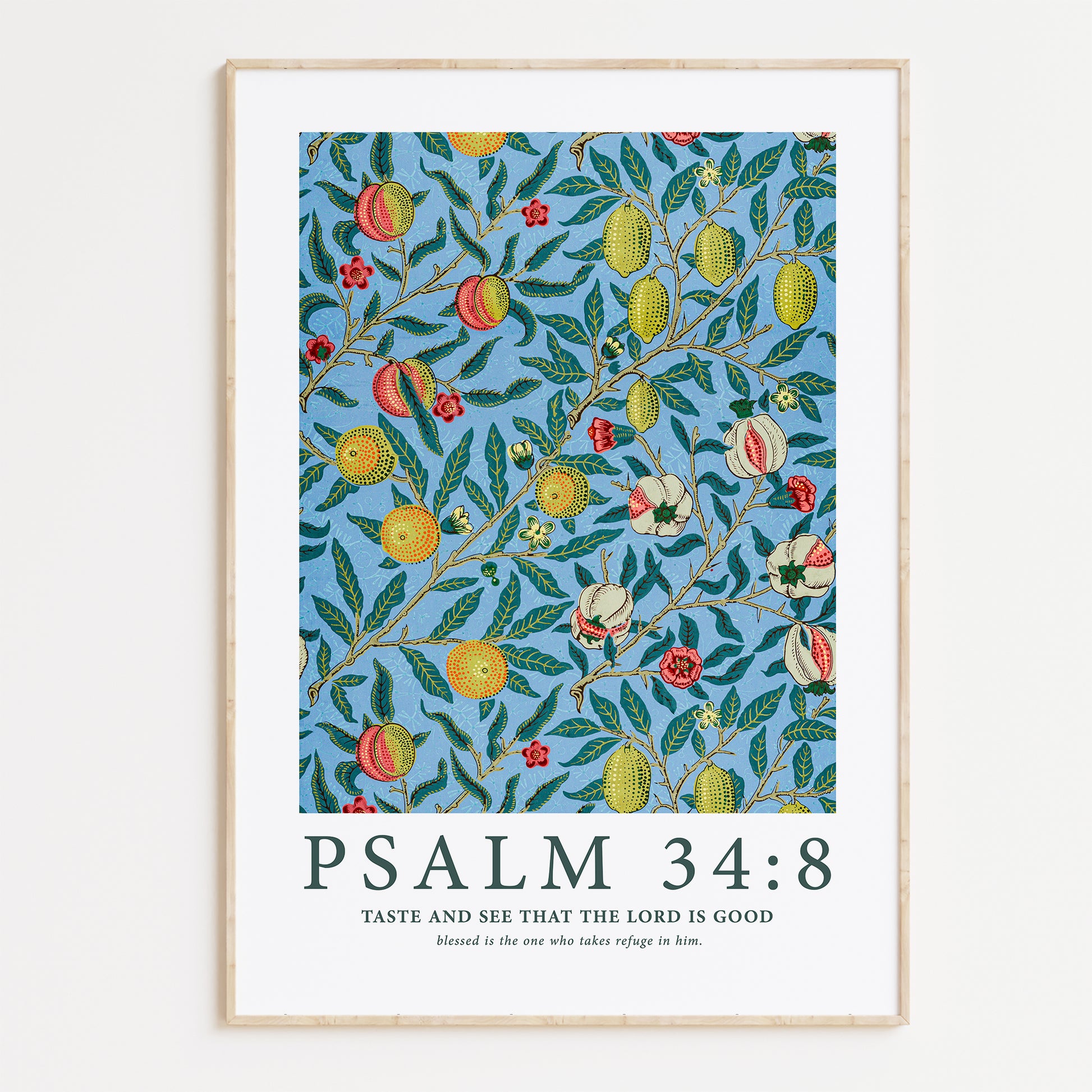 Framed Christian wall art print featuring a colorful fruit and floral pattern inspired by William Morris. Displays the Bible verse Psalm 34:8: "Taste and see that the Lord is good; blessed is the one who takes refuge in him." This artwork blends classic, nature-inspired design with a reassuring scripture, making it a vibrant addition to any Christian home. Elegantly framed in light wood, perfect for enhancing living room or kitchen decor.